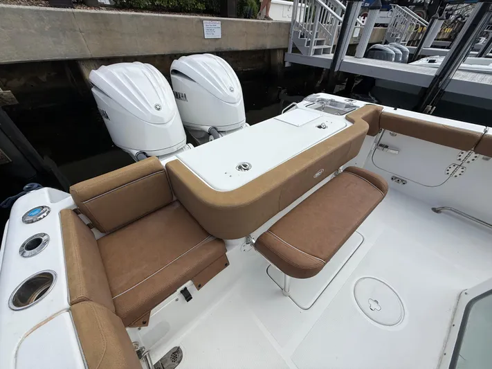  Yacht Photos Pics 2023 Sea Hunt Gamefish 30 boat with forward seating and twin outboard engines.