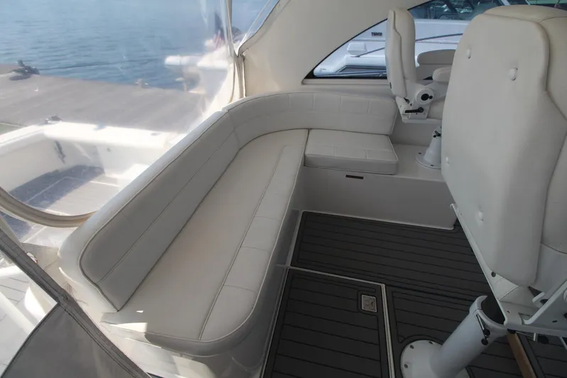 Pescador Yacht Photos Pics 2013 Cabo 40 Hardtop Express interior with white seating and ocean view.