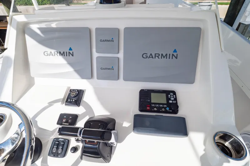 Yacht Photos Pics Control panel of a 2015 Intrepid 327 Cuddy with Garmin navigation equipment.