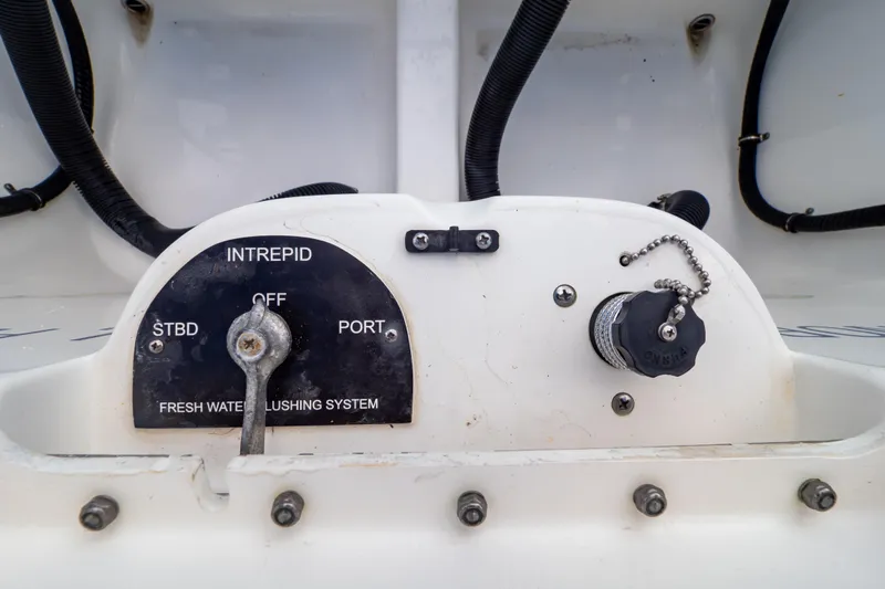  Yacht Photos Pics Control panel of 2015 Intrepid 327 Cuddy boat's fresh water flushing system.