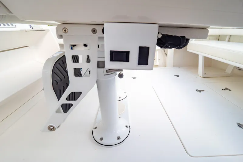  Yacht Photos Pics 2015 Intrepid 327 Cuddy interior detail showcasing seating and deck features.