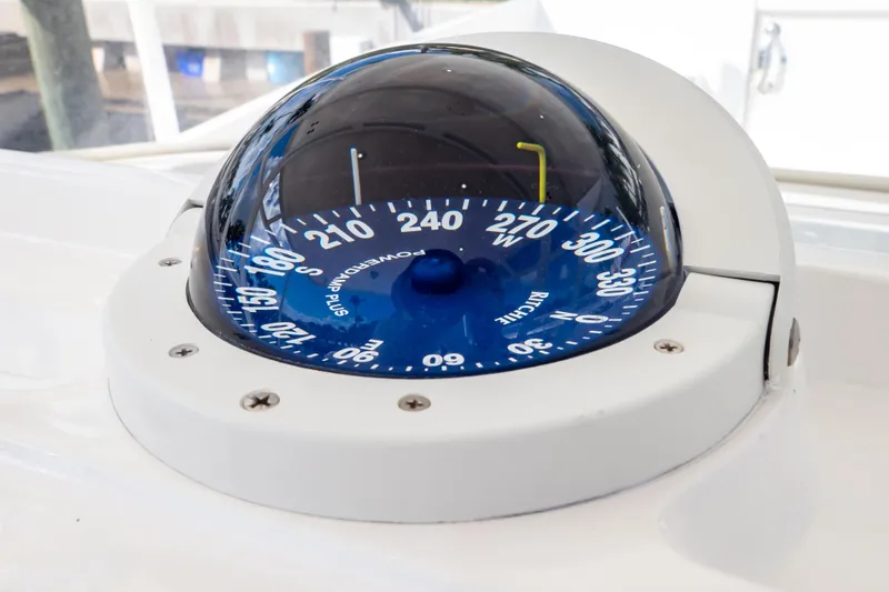 Yacht Photos Pics Compass on 2015 Intrepid 327 Cuddy boat, displaying navigational directions.