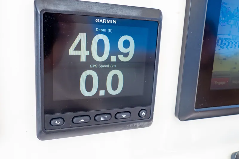  Yacht Photos Pics Garmin display on 2015 Intrepid 327 Cuddy showing depth 40.9 ft, speed 0.0 kt.