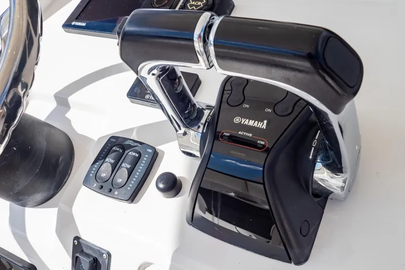  Yacht Photos Pics Close-up of Yamaha throttle controls on a 2015 Intrepid 327 Cuddy boat.