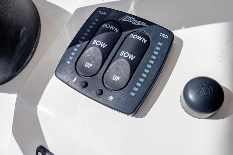  Yacht Photos Pics Bennett trim tab control panel on 2015 Intrepid 327 Cuddy boat dashboard.