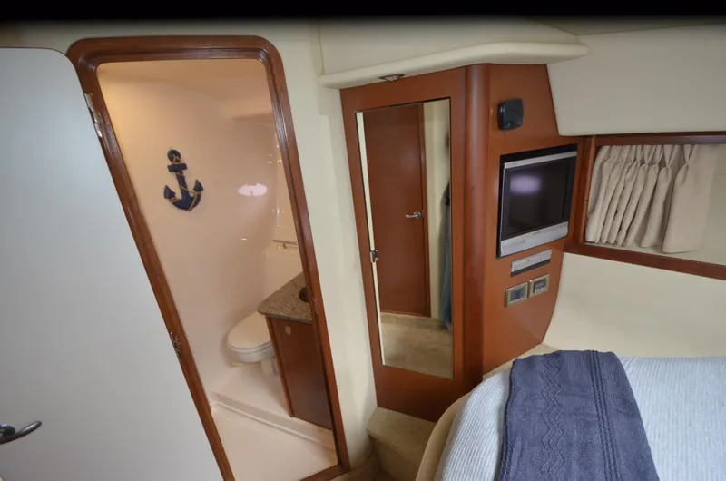  Yacht Photos Pics Interior of 2007 Sea Ray 38 Sundancer yacht with bathroom and bedroom amenities.