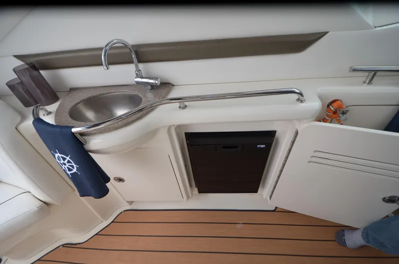  Yacht Photos Pics 2007 Sea Ray 38 Sundancer yacht interior with sink and mini fridge.