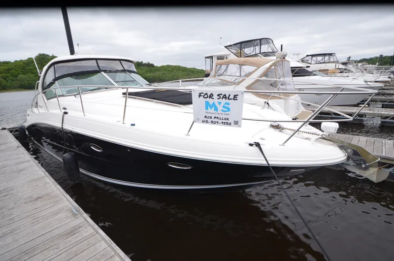  Yacht Photos Pics 2007 Sea Ray 38 Sundancer yacht for sale, docked at marina.