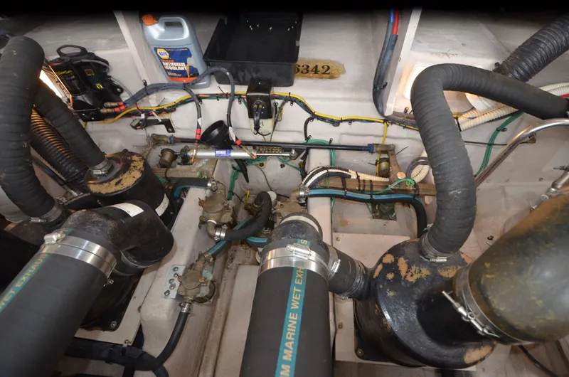  Yacht Photos Pics Engine room of 2007 Sea Ray 38 Sundancer with visible hoses and wiring.