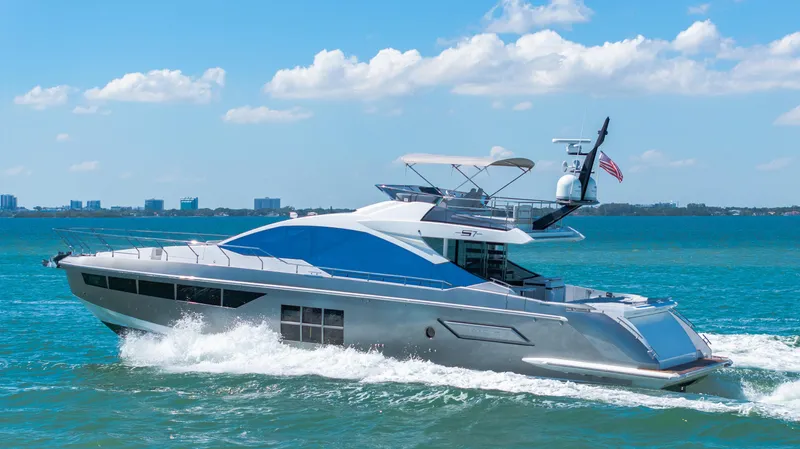 Swaha Yacht Photos Pics 2018 Azimut S7 yacht cruising on blue ocean under clear sky.