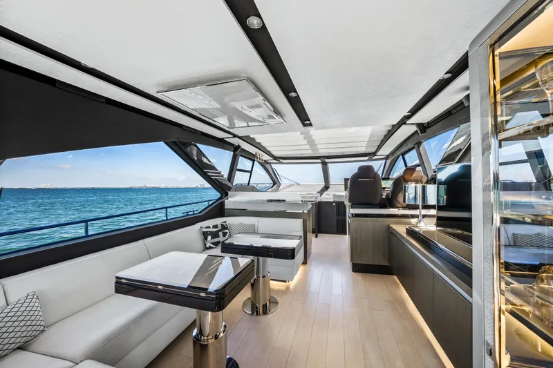 Swaha Yacht Photos Pics Luxurious interior of 2018 Azimut S7 yacht with modern furnishings and ocean view.