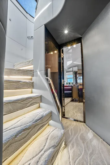 Swaha Yacht Photos Pics Interior of 2018 Azimut S7 yacht with elegant staircase and modern design.
