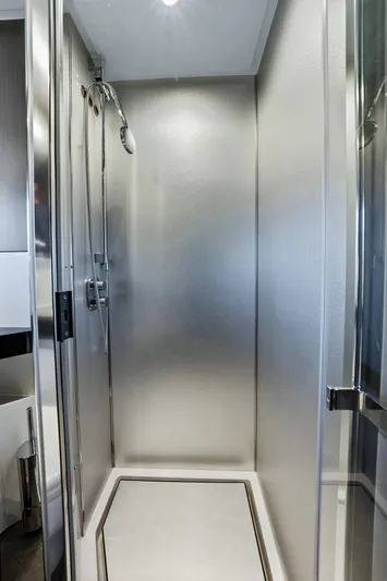 Swaha Yacht Photos Pics Shower area in 2018 Azimut S7 yacht, featuring sleek modern design and chrome fixtures.