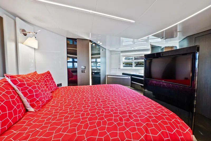 Swaha Yacht Photos Pics Luxurious 2018 Azimut S7 yacht bedroom with red geometric bedding and modern decor.
