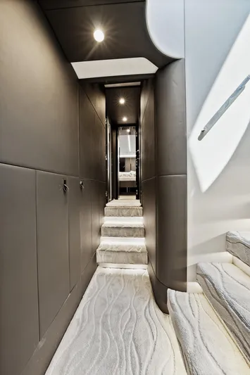 Swaha Yacht Photos Pics Interior hallway of 2018 Azimut S7 yacht with modern design and elegant lighting.