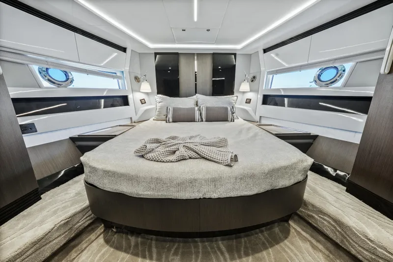 Swaha Yacht Photos Pics Luxurious bedroom interior of 2018 Azimut S7 yacht with modern design and elegant furnishings.