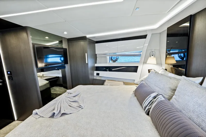 Swaha Yacht Photos Pics Luxurious interior of 2018 Azimut S7 yacht bedroom with modern design and elegant furnishings.