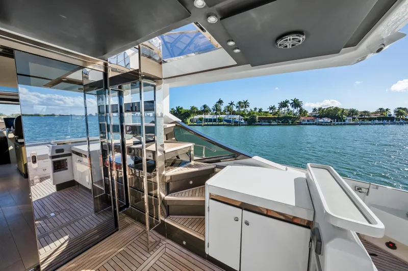 Swaha Yacht Photos Pics Luxurious 2018 Azimut S7 yacht deck with scenic waterfront view.
