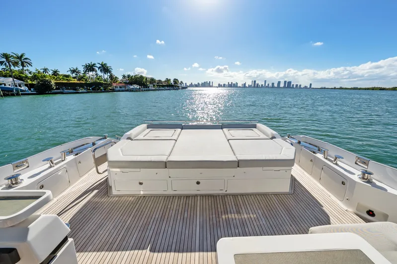 Swaha Yacht Photos Pics Luxurious 2018 Azimut S7 yacht deck with ocean view and city skyline.