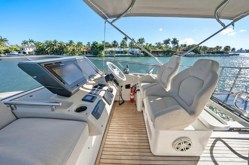 Swaha Yacht Photos Pics Luxurious 2018 Azimut S7 yacht helm with dual seats and advanced navigation system.
