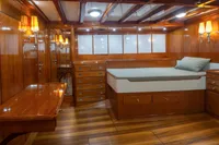 Luxurious wooden interior of 1929 Camper & Nicholsons J Class yacht cabin.