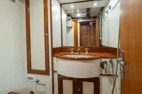 Luxurious wooden bathroom interior on 1929 Camper & Nicholsons J Class yacht.