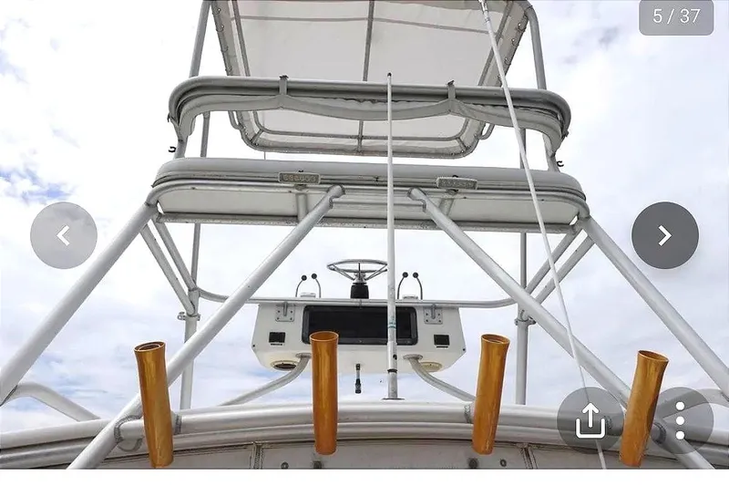  Yacht Photos Pics View of the helm on a 1997 Pursuit 3000 Express boat.