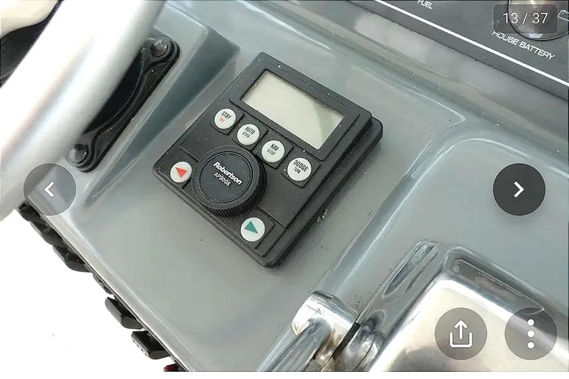  Yacht Photos Pics Control panel of a 1997 Pursuit 3000 Express boat.