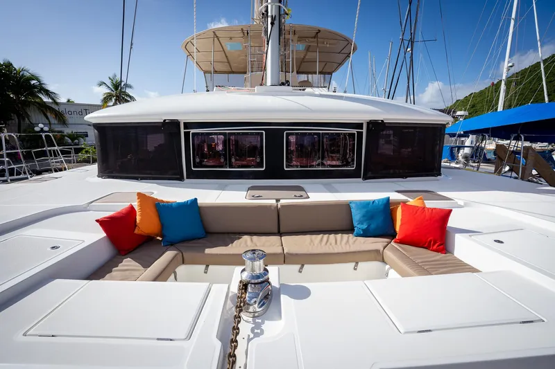 Copper Penny Yacht Photos Pics Luxurious 2011 Lagoon 560 yacht with colorful cushions and spacious deck seating.