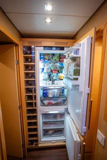 Copper Penny Yacht Photos Pics Spacious kitchen fridge in 2011 Lagoon 560 yacht, stocked with food and beverages.