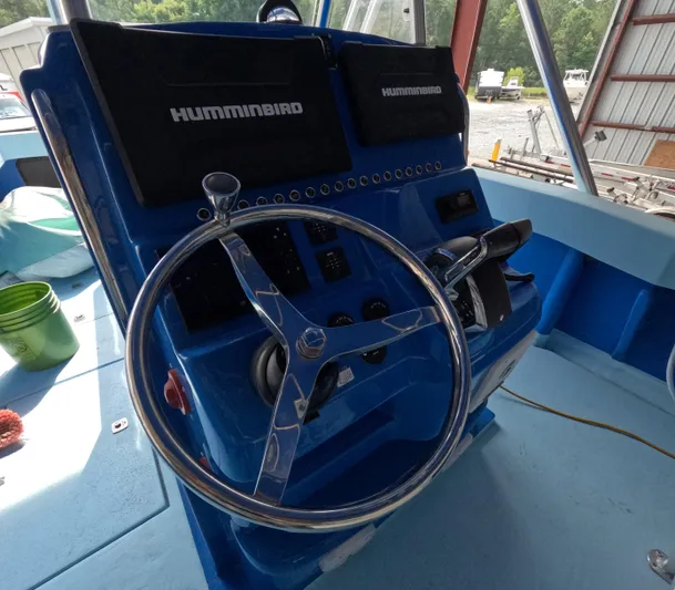 Cool Change Yacht Photos Pics Steering console of 2022 Eastward 30 boat with Humminbird electronics.