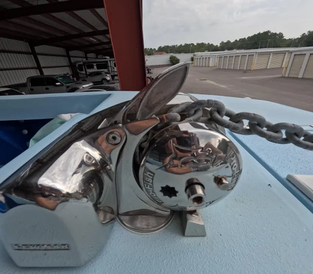 Cool Change Yacht Photos Pics Close-up of a 2022 Eastward 30 boat's anchor windlass with chain.