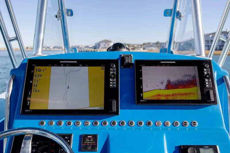 Cool Change Yacht Photos Pics Dashboard of 2022 Eastward 30 boat with navigation and sonar displays.