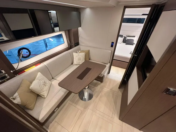 Sealine S390 Yacht Photos Pics Luxurious interior of 2022 Sealine S390 yacht with elegant seating and modern design.