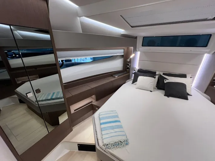 Sealine S390 Yacht Photos Pics Luxurious interior of 2022 Sealine S390 yacht with modern bedroom design.