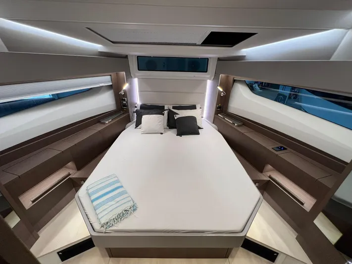 Sealine S390 Yacht Photos Pics Luxurious cabin interior of 2022 Sealine S390 yacht with modern design and ambient lighting.