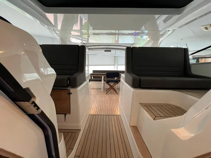 Sealine S390 Yacht Photos Pics 2022 Sealine S390 yacht interior with sleek seating and modern design.