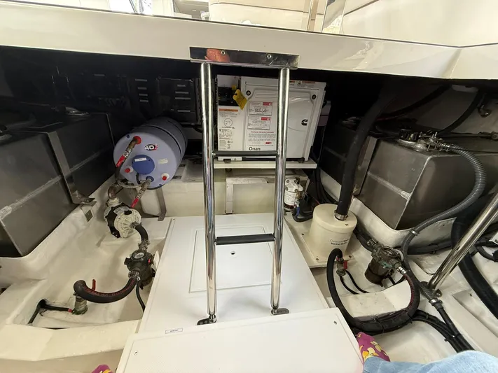 Moana & Malie Yacht Photos Pics Engine room of 2025 Schaefer 375 yacht, featuring mechanical components and equipment.