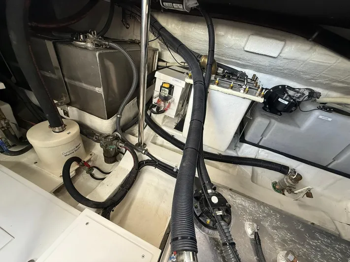 Moana & Malie Yacht Photos Pics Engine compartment of 2025 Schaefer 375 yacht with visible wiring and components.