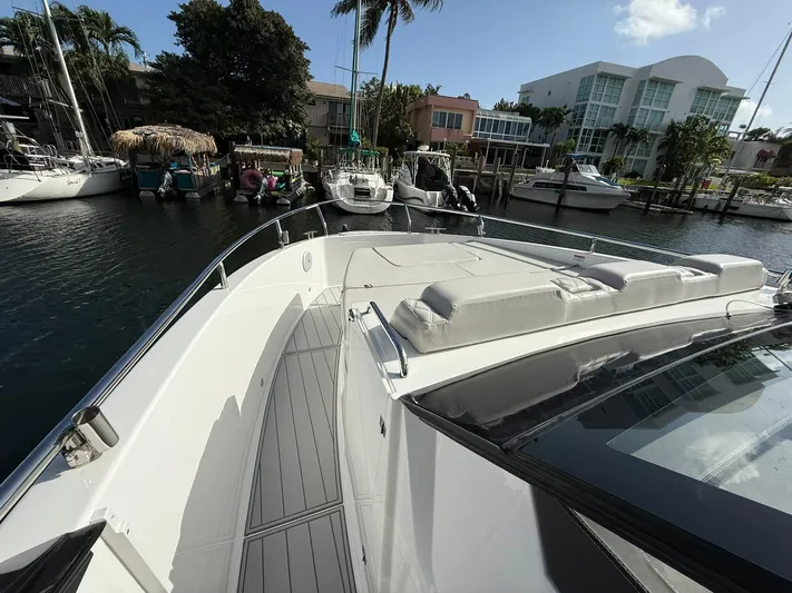 Moana & Malie Yacht Photos Pics 2025 Schaefer 375 yacht docked in a marina, featuring sleek design and spacious deck.