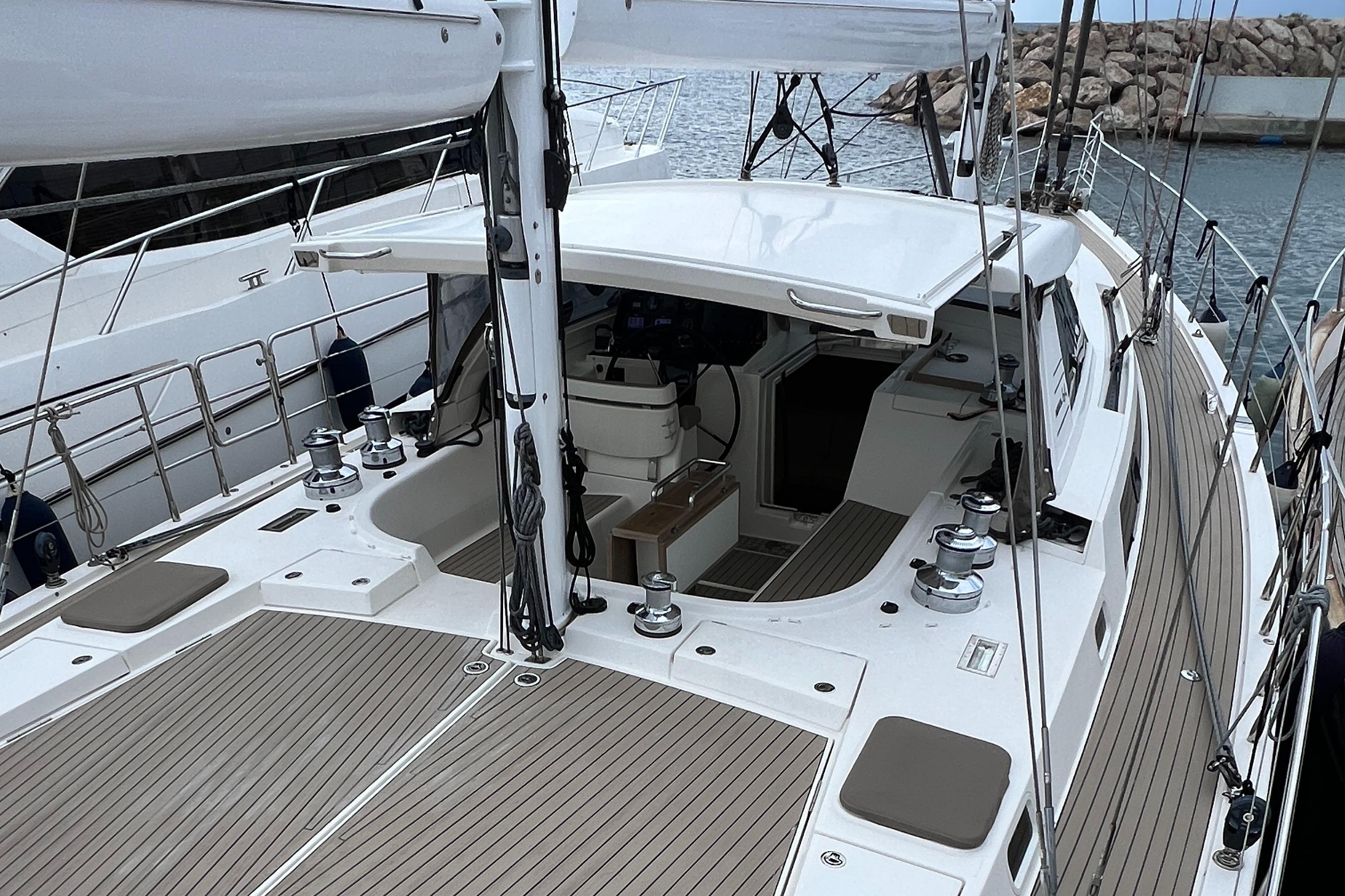 Luxury Amel 64 yacht deck, 2016 model, featuring sleek design and spacious layout.