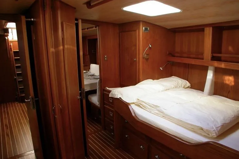 Matchless Yacht Photos Pics Luxurious wooden interior of 1982 Chantier Naval de l&rsquo;Anitra RON HOLLAND 68 yacht cabin.