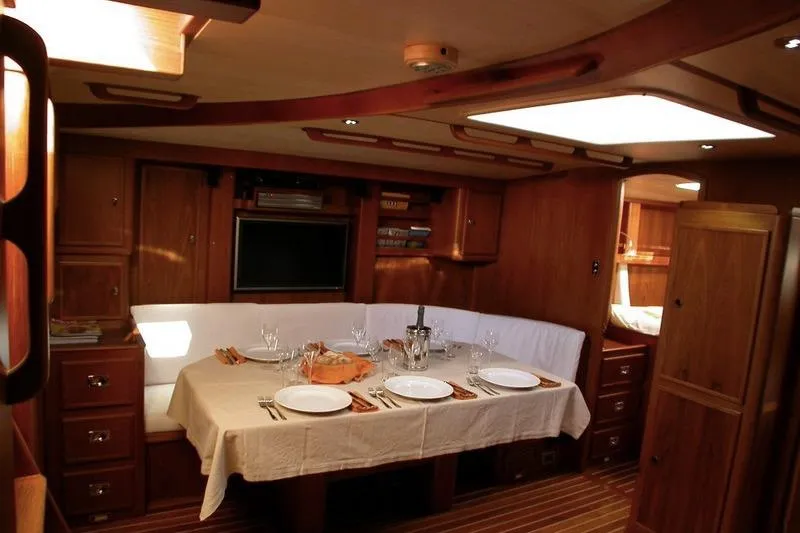 Matchless Yacht Photos Pics Luxurious dining area inside 1982 Chantier Naval de l&rsquo;Anitra RON HOLLAND 68 yacht.