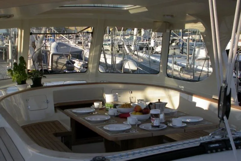 Matchless Yacht Photos Pics Luxurious dining area on 1982 Chantier Naval de l&rsquo;Anitra RON HOLLAND 68 yacht.