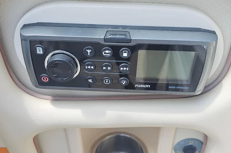 Taipan Yacht Photos Pics Fusion MS-IP600 stereo system on 2006 Chris-Craft Corsair 36 boat dashboard.