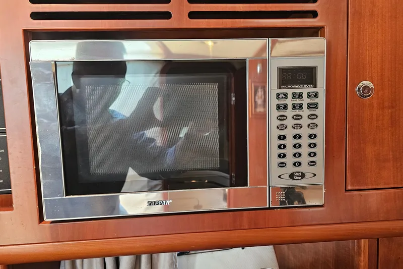 Taipan Yacht Photos Pics Built-in Tappan microwave oven in 2006 Chris-Craft Corsair 36 yacht kitchen.