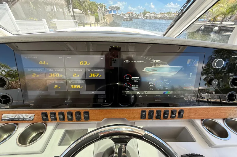 Yacht Photos Pics 2022 Regal 38 SAV dashboard with digital displays and navigation controls.