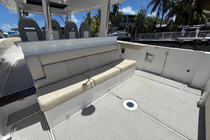  Yacht Photos Pics 2022 Regal 38 SAV boat interior with beige seating and modern design.