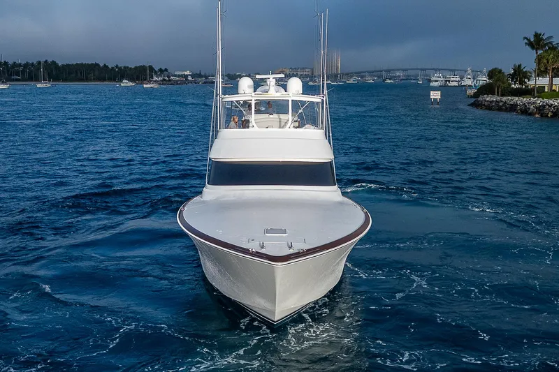 South Jersey Yacht Sales Demo Boat Yacht Photos Pics 2025 Viking 64 Convertible yacht cruising in open water.