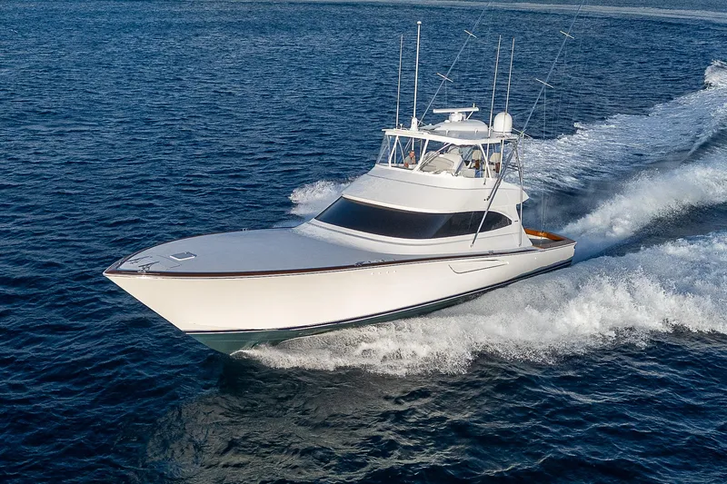 South Jersey Yacht Sales Demo Boat Yacht Photos Pics 2025 Viking 64 Convertible yacht cruising on open water.